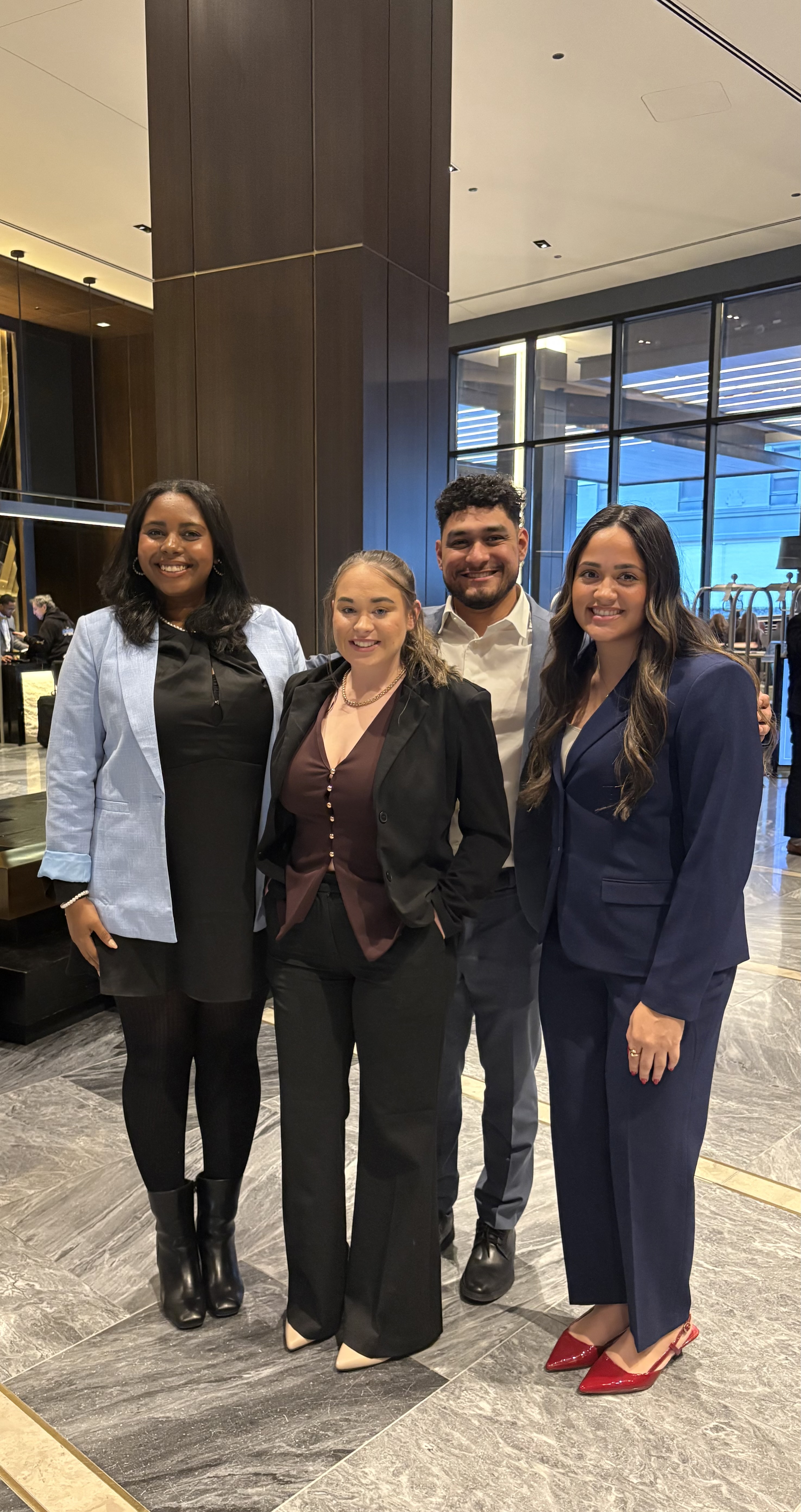 Team at conference hotel lobby